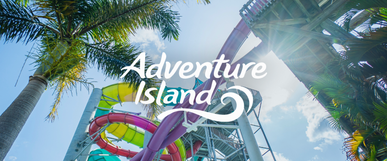 The Adventure Island logo with a waterslide & palm tree in background