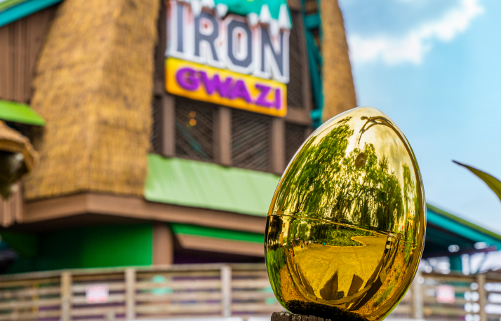 Golden egg in front of Iron Gwazi at Busch Gardens Tampa Bay.