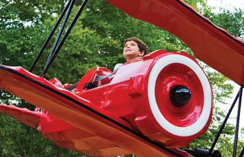 Child riding Der Roto Baron at Busch Gardens Williamsburg