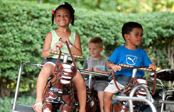 Two children riding Li'l Clydes at Busch Gardens Williamsburg