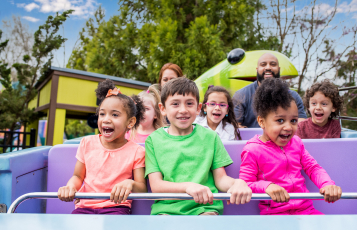 Children riding Oscar's Whirly Worms